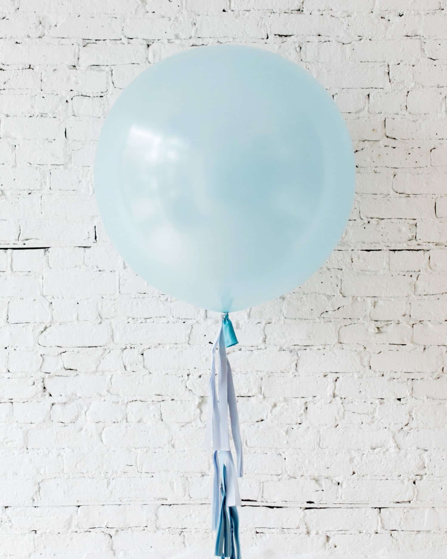 Pearl Light Blue Giant Balloon and Ombre Blue Tassel | Rental