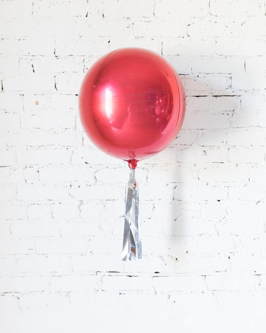 16in Red Orb Foil Balloon and Silver Skirt | Rental 16in Red Orb Foil Balloon and Silver Skirt | Rental