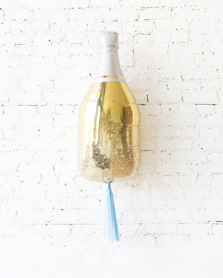 36in Gold Champagne Bottle Foil Balloon and French Blue Skirt | Rental 36in Gold Champagne Bottle Foil Balloon and French Blue Skirt | Rental